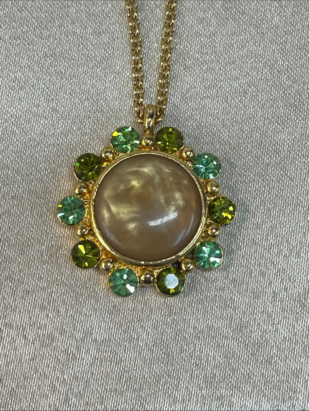 Gold-Tone Necklace with Beige Center and Green Crystal Halo